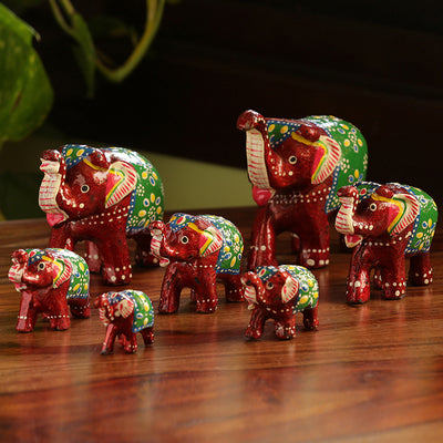 'Seven Tuskers In Maroon' Hand Carved & Hand Painted Showpiece In Fibre