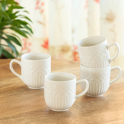 ExclusiveLane 'Minimalist' Ceramic Tea And Coffee Mugs (Set of 4,  340 ML, Microwave Safe, Hand-Embossed)
