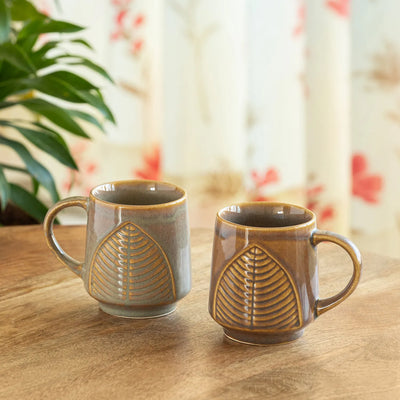 ExclusiveLane 'Leaf & Lines' Ceramic Tea And Coffee Mugs (Set of 2, 300 ML, Microwave Safe, Hand-Embossed)