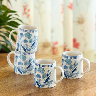 ExclusiveLane 'Floral Bliss' Ceramic Tea And Coffee Mugs (Set of 4, 300 ML, Microwave Safe, Handcrafted)
