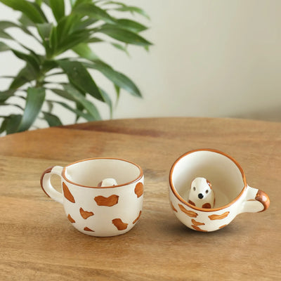 ExclusiveLane 'Puppy Surprise' Ceramic Tea And Coffee Mugs (Set of 2, 200 ML, Microwave Safe, Hand-Embossed)