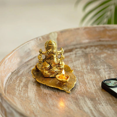 'Betel Leaf Ganesha' Idol Showpiece Figurine with Diya (1 Wick, 7.9 cm, Golden, Metal, Handcrafted)