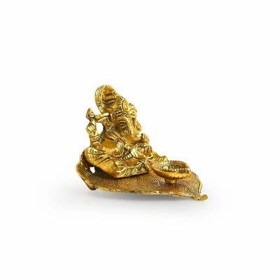 'Betel Leaf Ganesha' Idol Showpiece Figurine with Diya (1 Wick, 7.9 cm, Golden, Metal, Handcrafted)