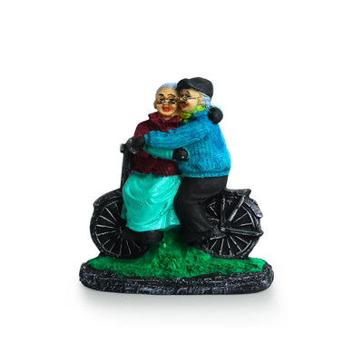 'Italian Old Cycling Couple' Modern Decorative Showpiece Statue (Resin, Handcrafted, 19.1 cm)