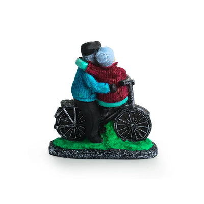 'Italian Old Cycling Couple' Modern Decorative Showpiece Statue (Resin, Handcrafted, 19.1 cm)