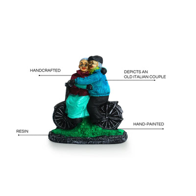 'Italian Old Cycling Couple' Modern Decorative Showpiece Statue (Resin, Handcrafted, 19.1 cm)