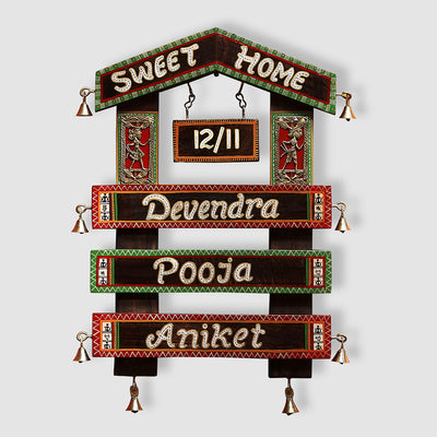 'Home Of The Heart' Customisable Hut Shaped Warli & Dhokra Wooden Name Plate With Handwritten Fonts