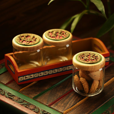 ‘Three's A Tribe’ Dhokra Snacks Jar Set In Glass With Warli Hand-Painted Wooden Tray